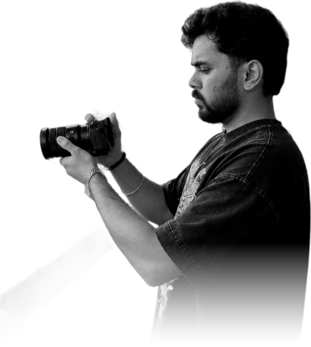Prateek holding a camera